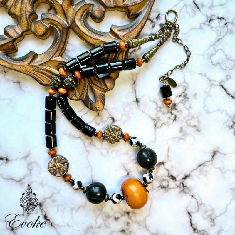 Black Necklace with Copal Amber and Dzi Beads Evoke by Suhita